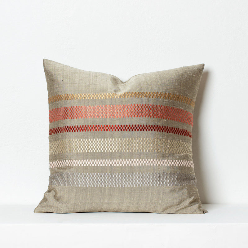Handwoven silk cushion in hemp color with Laotian checkered stripes in beige and brick red hues  